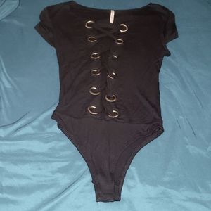 Cut open criss-cross body suit